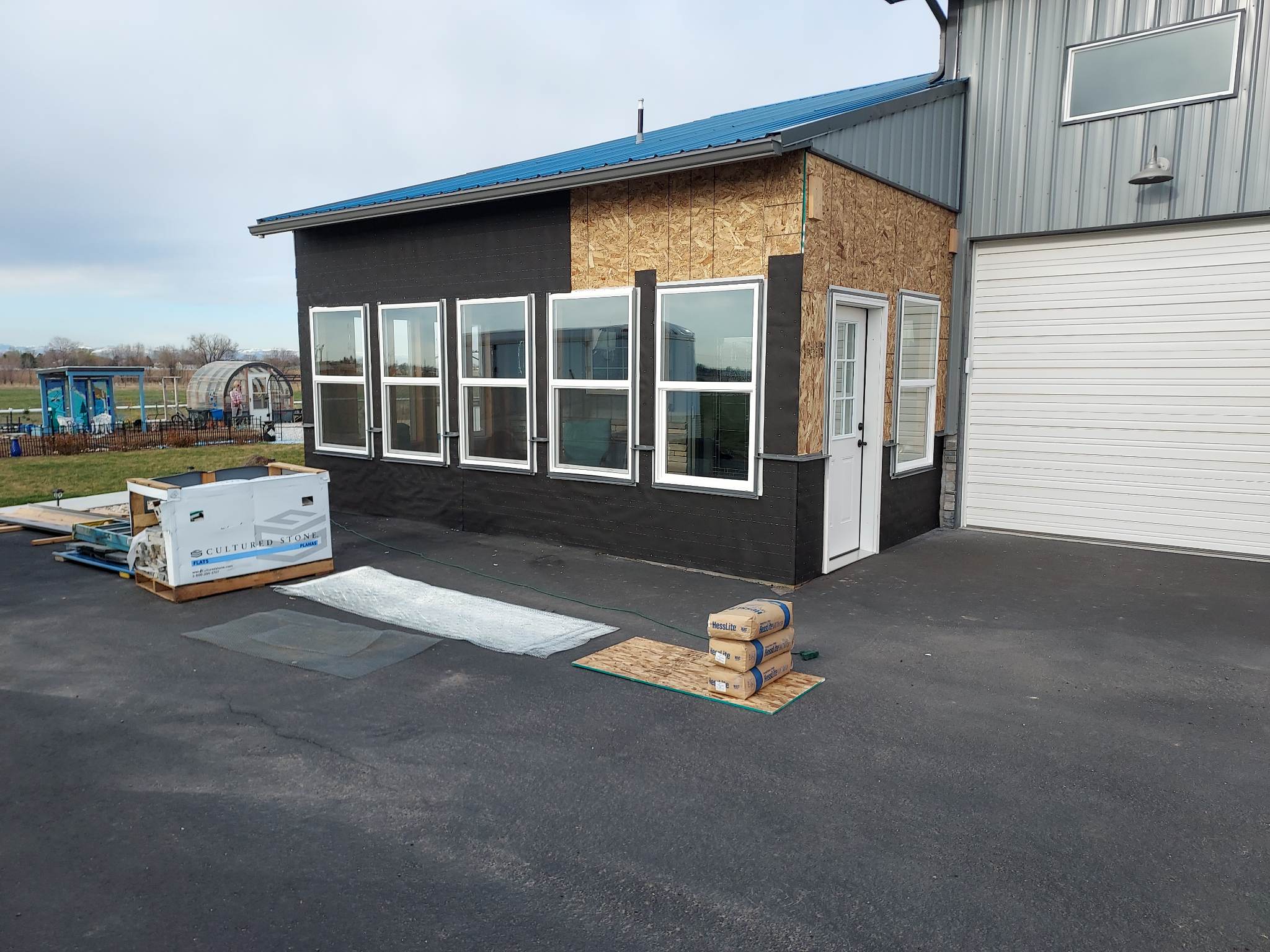 Warehouse with new siding going up