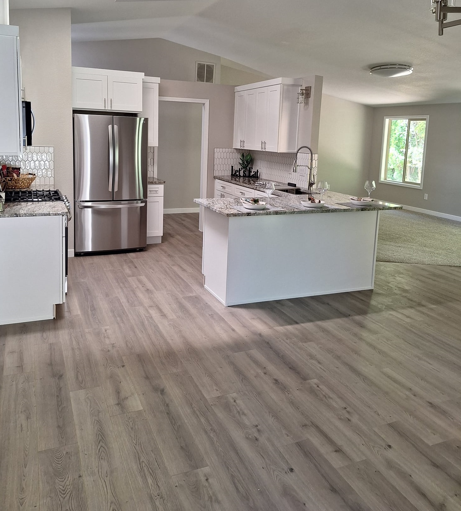 Large house with new wood grain vinyl flooring install