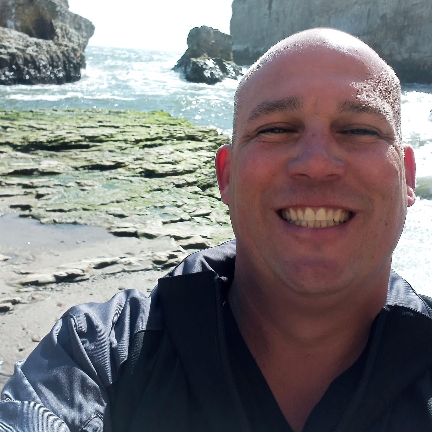 A picture of a man, smiling