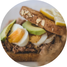 Sandwich with eggs, avocado and beef